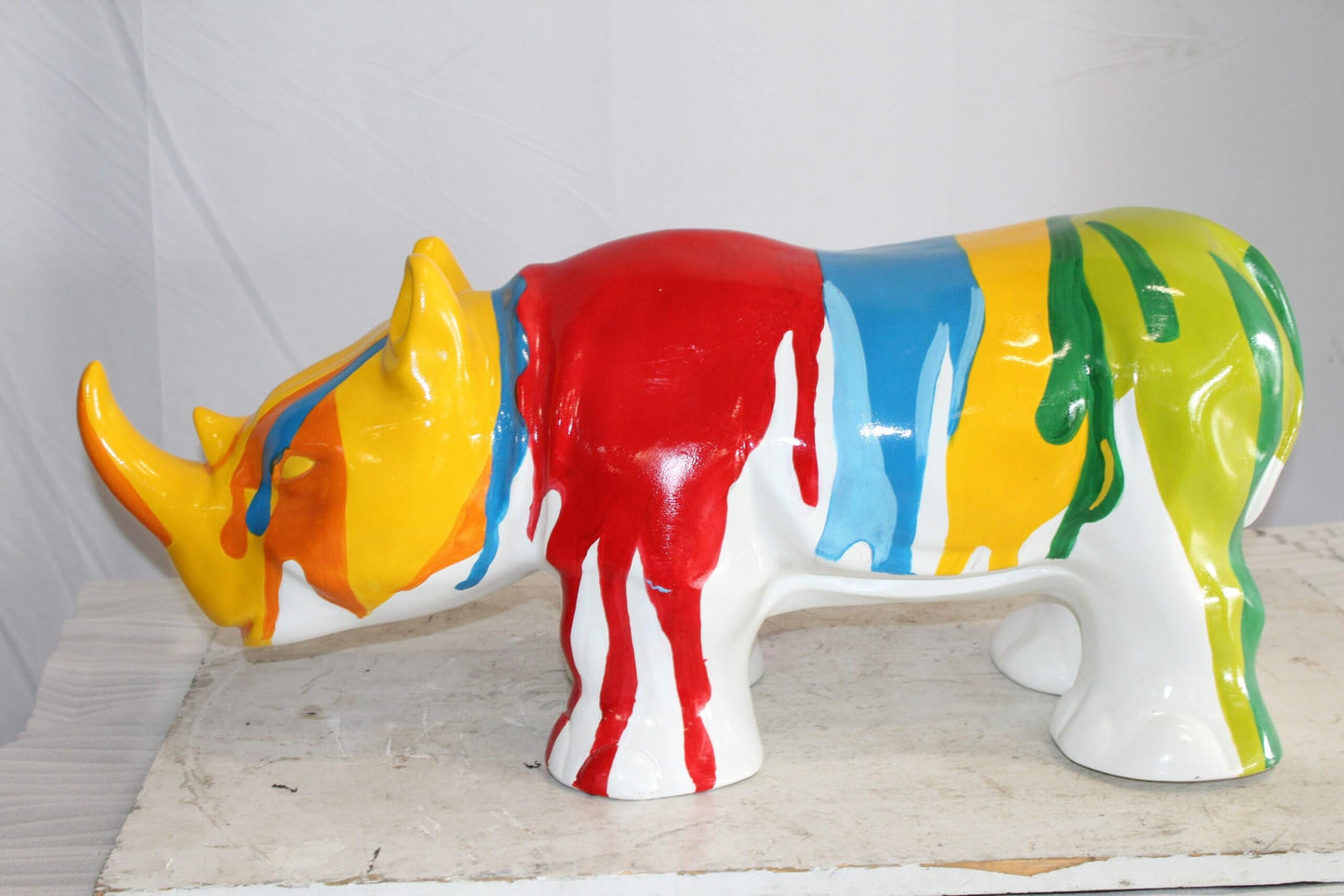 Fiberglass Rhino Statue Dynamic Presence with Paint Droplets 30" x 12" x 12"H