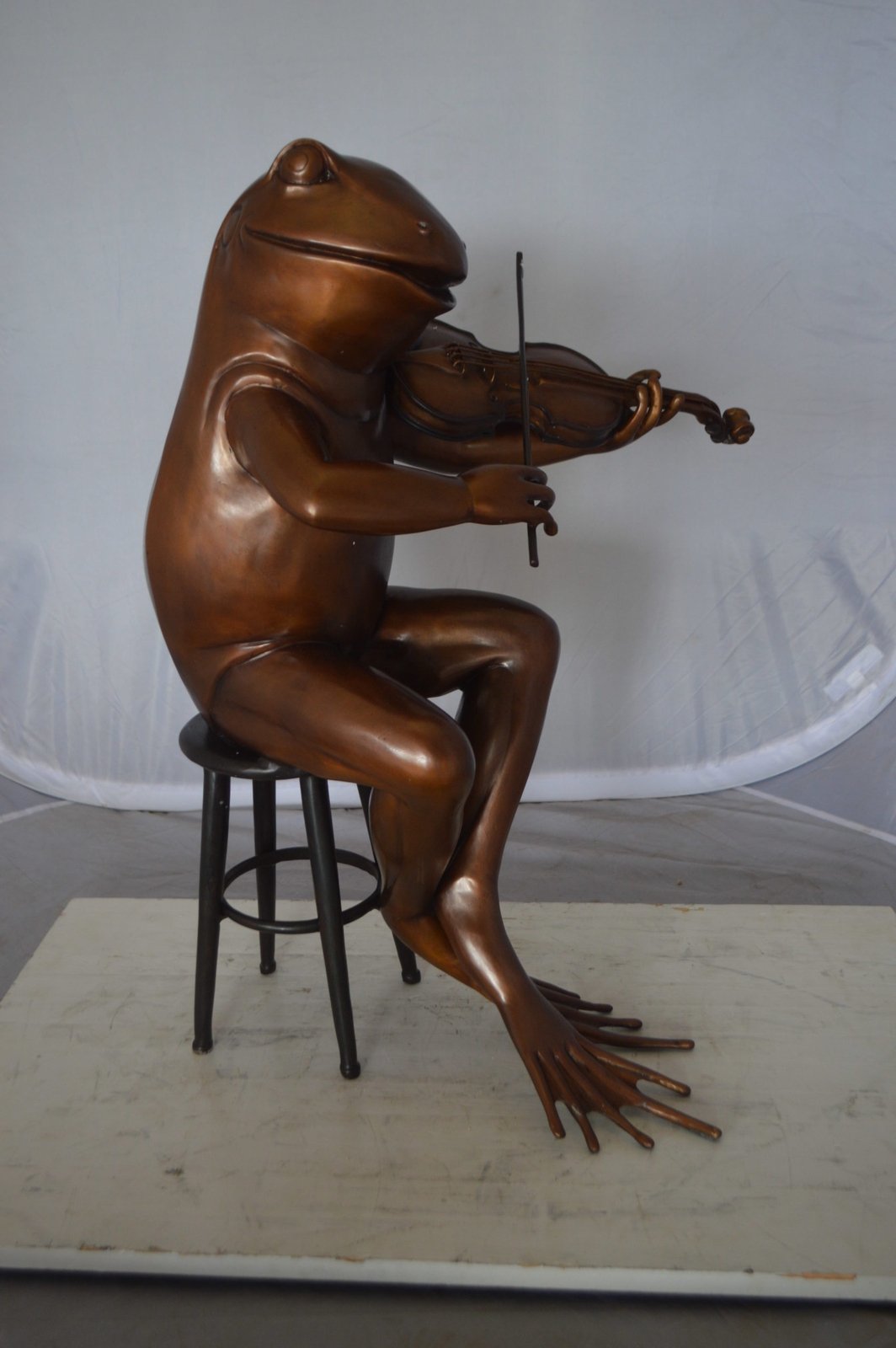 Nifao Human-Size Bronze Frog Playing Violin Statue – Whimsical Animal Musician Sculpture on Chair, Indoor/Outdoor Decor - 29" L x 18" W x 29" H