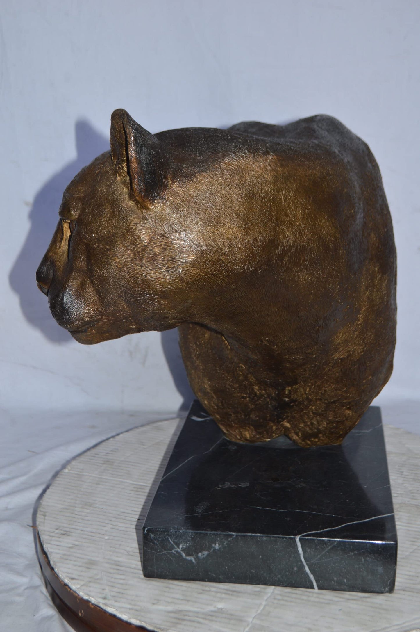 Mountain Lion Head bronze statue on a marble base - Size: 18"L x 15"W x 21"H.