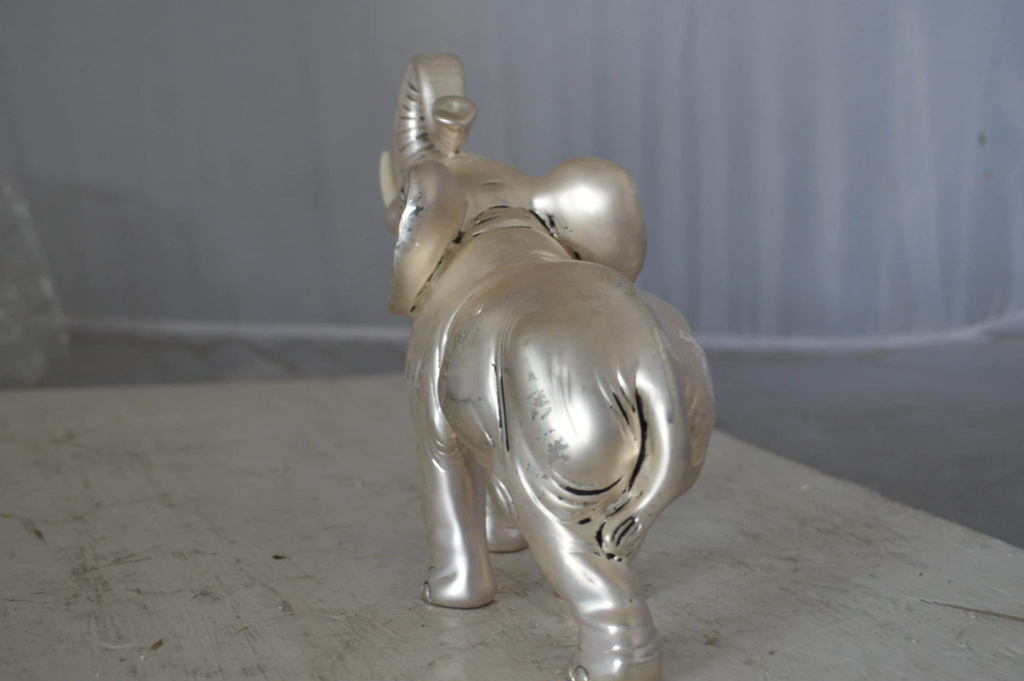 Elephant statue made of resin - Size: 9"L x 4"W x 8"H.