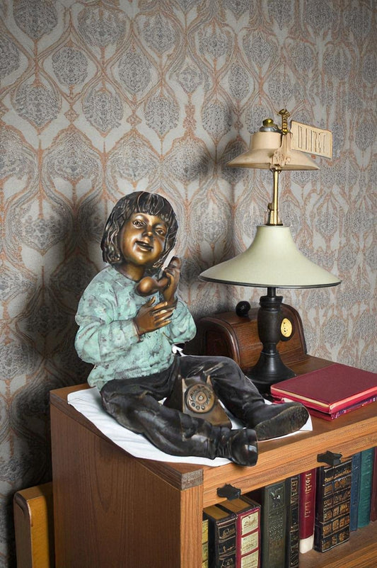 Young Child With an Old Telephone Bronze Statue -  Size: 21"L x 14"W x 19"H.