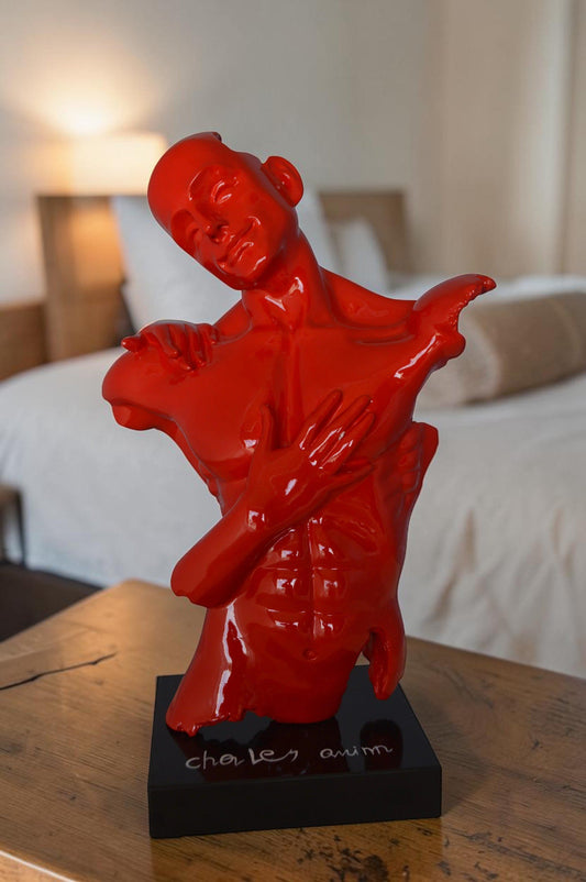 Modern resin statue of a man hugged by a woman - Size: 17"L x 8"W x 24"H.