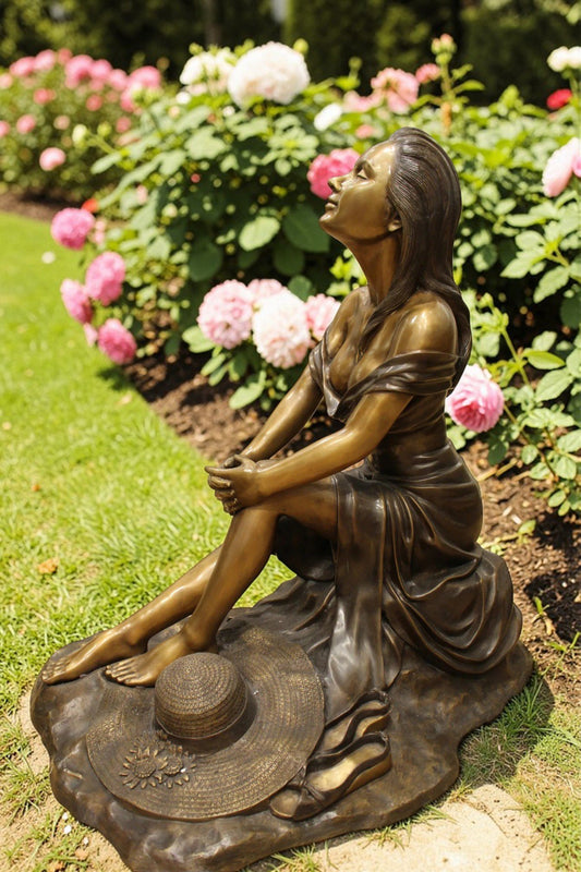 Lady on Stone Bronze Statue - Size: 33"L x 23"W x 34"H.