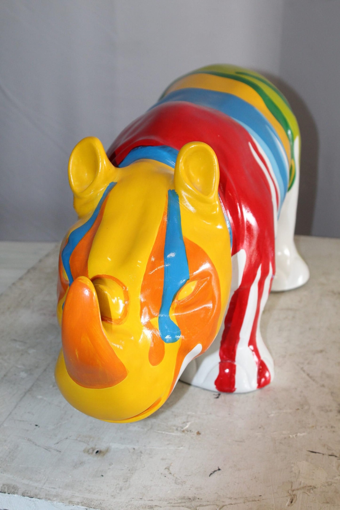 Fiberglass Rhino Statue Dynamic Presence with Paint Droplets 30" x 12" x 12"H