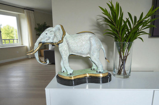 Elephant trunk Down Bronze Statue - Size: 28"L x 12"W x 17"H.