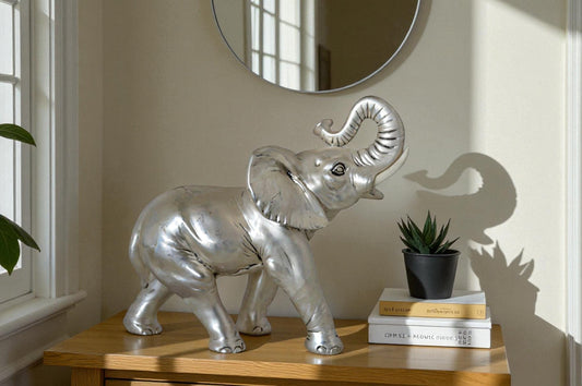 Elephant statue made of resin - Size: 9"L x 4"W x 8"H.