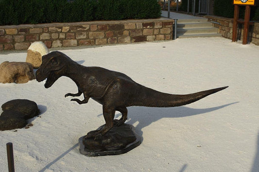 Tyrannosaurus Rex Dinosaur Bronze Statue -  Size: 31"L x 12"W x 15"H.