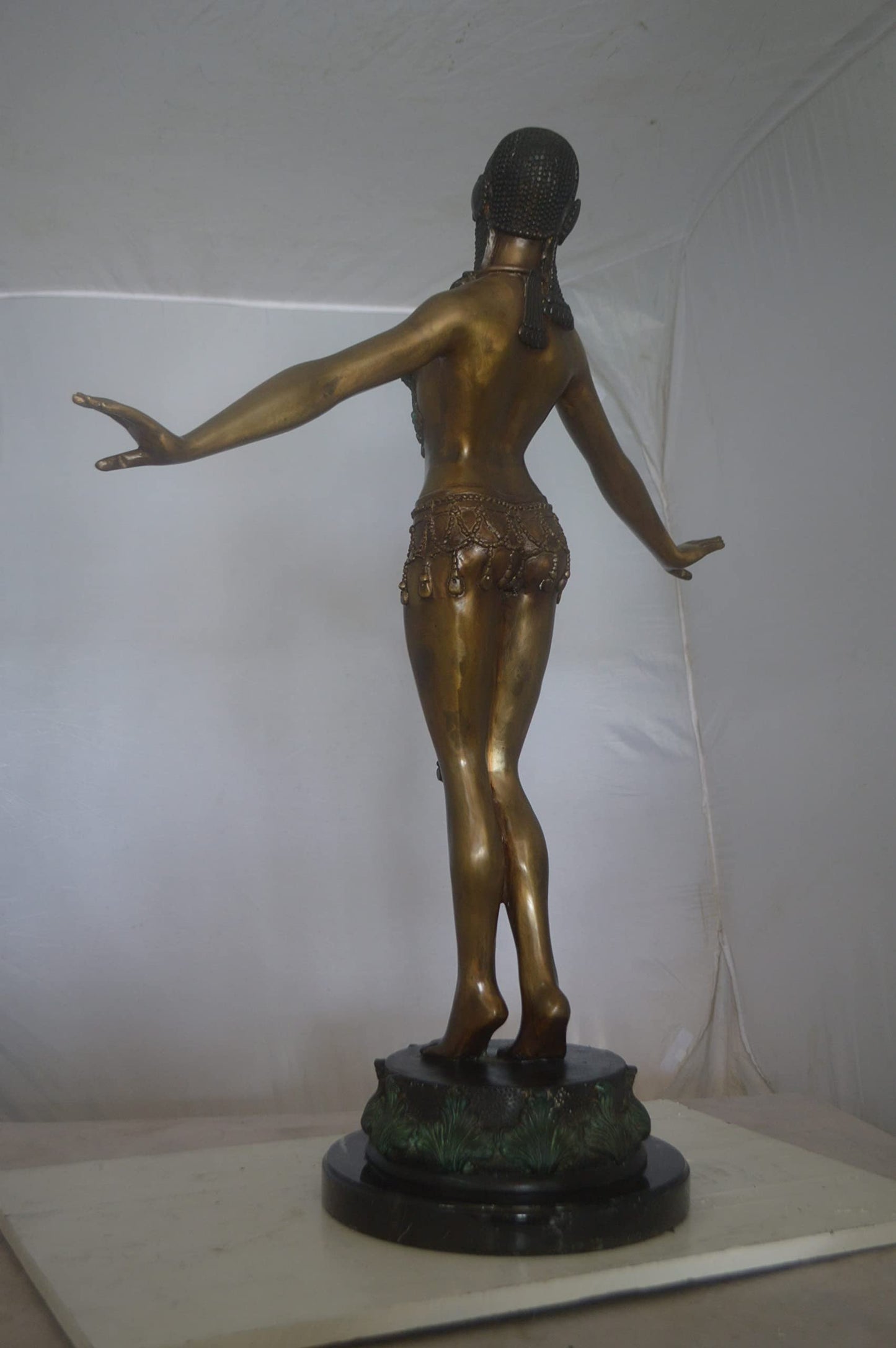 Belly Dancer Performing Bronze Statue - Size: 32"L x 8"W x 41"H.