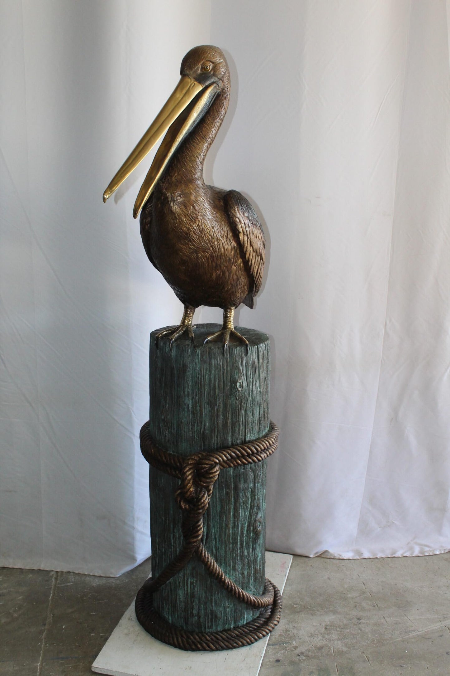 Lifesize Bronze Pelican Fountain Mounted on a Tree Stamp 33" x 23" x 73"H