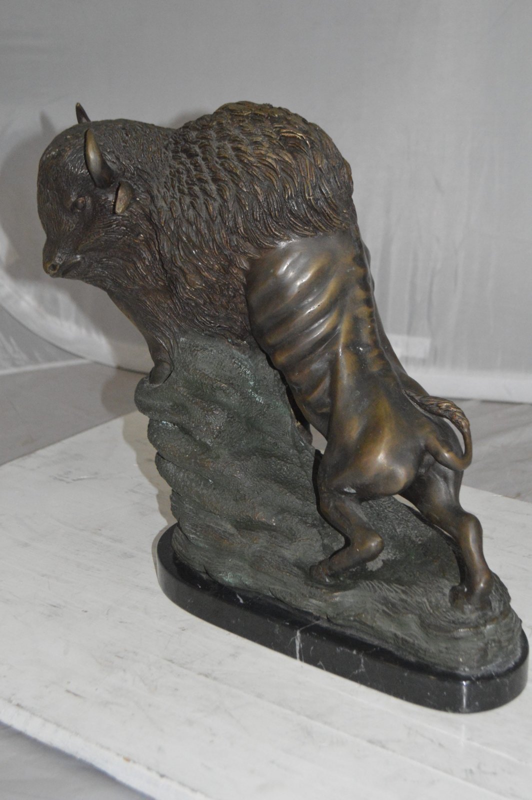 Bison Bronze Statue - Size: 7"L x 14"W x 15"H.