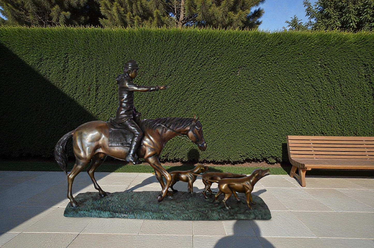 Hunter with 3 dogs Bronze Statue - Size: 26"L x 8"W x 19"H.