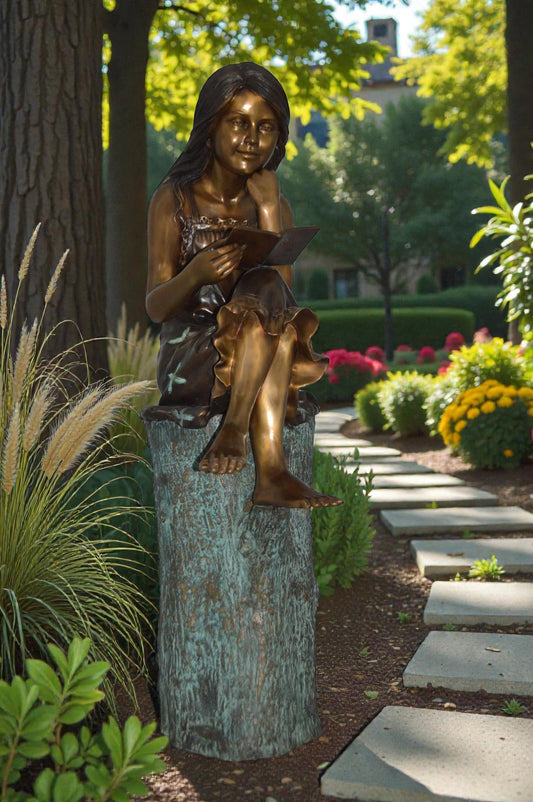 Sitting Girl on Log Reading a Book Bronze Statue - Size: 19"L x 13"W x 48"H.