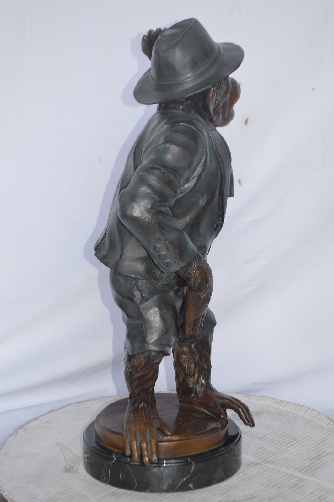 Monkey in Suit bronze statue - Size: 16"L x 10"W x 27"H.