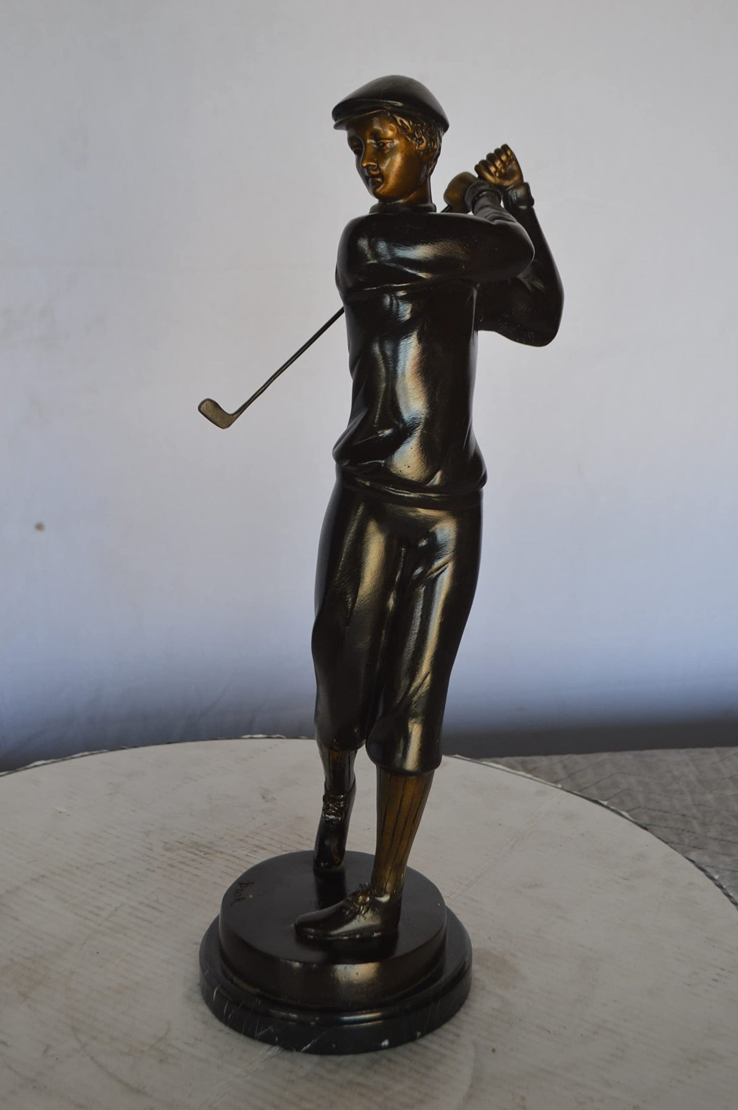 Young Golfer Bronze Statue mounted on a Marble Base - Size: 8"L x 6"W x 19"H.