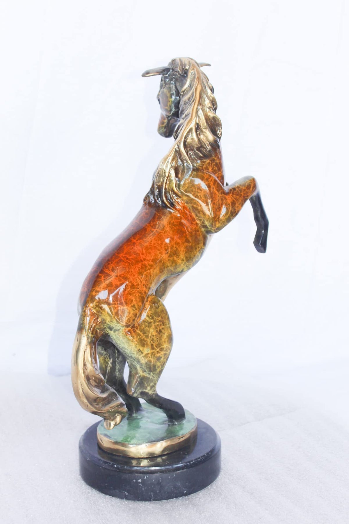 Colored rearing horse bronze statue - Size: 14"L x 7"W x 21"H.
