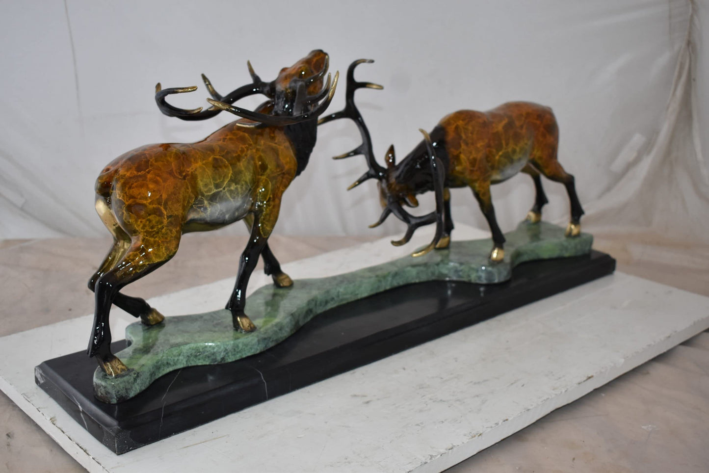Fighting Deer Bronze Statue Mounted on a Marble Base Size: 32" x 8" x 14"H