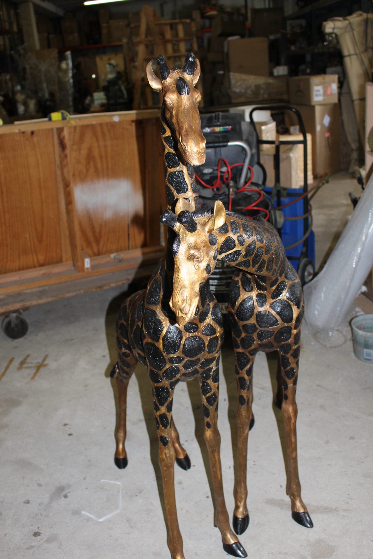 Pair of Giraffes Bronze Statues - Size: 32"L x 12"W x 55"H.