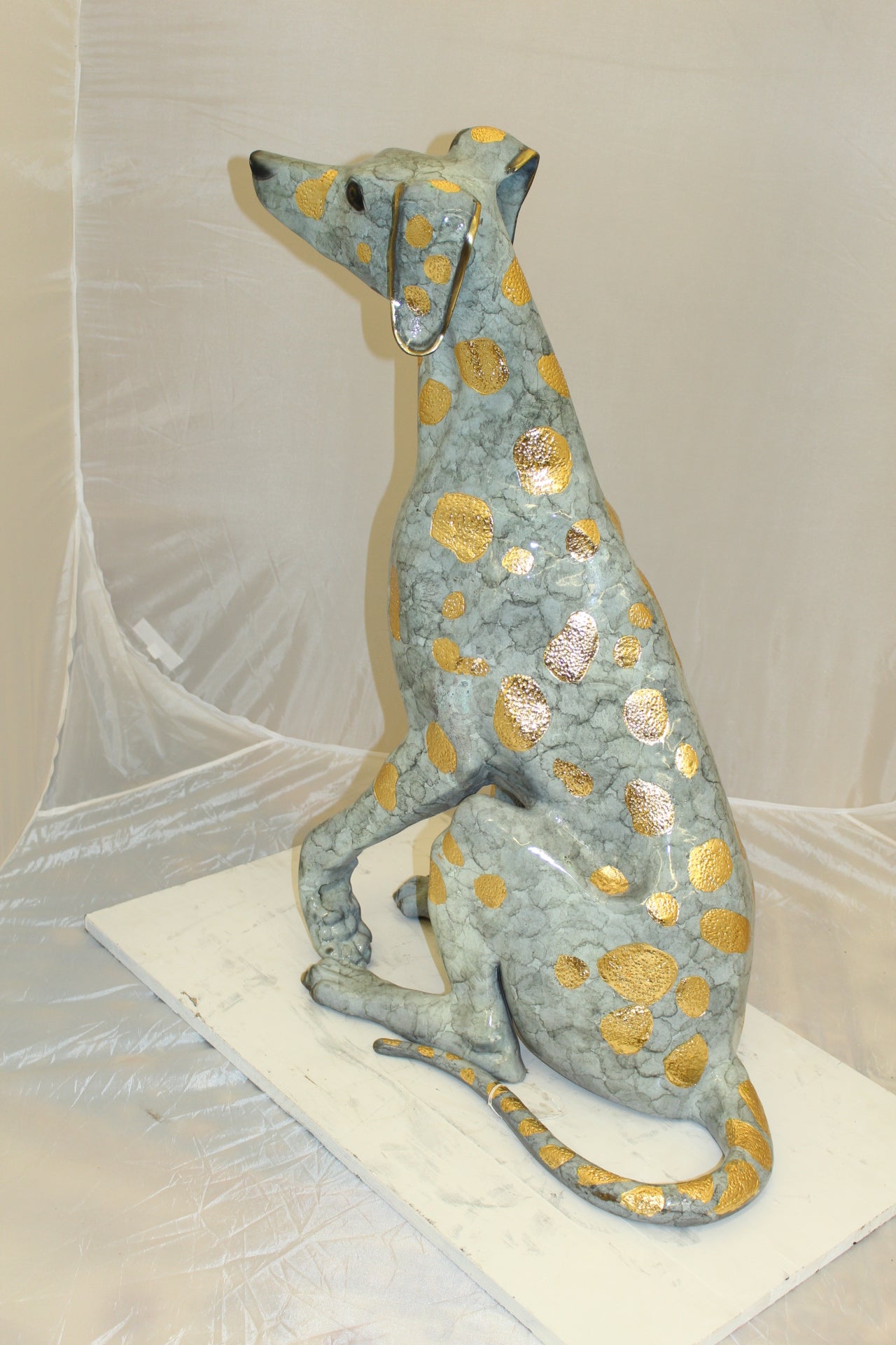 Pair of Golden Pleated Dalmatians Sitting Bronze Statue - 21"L x 16"W x 35"H.