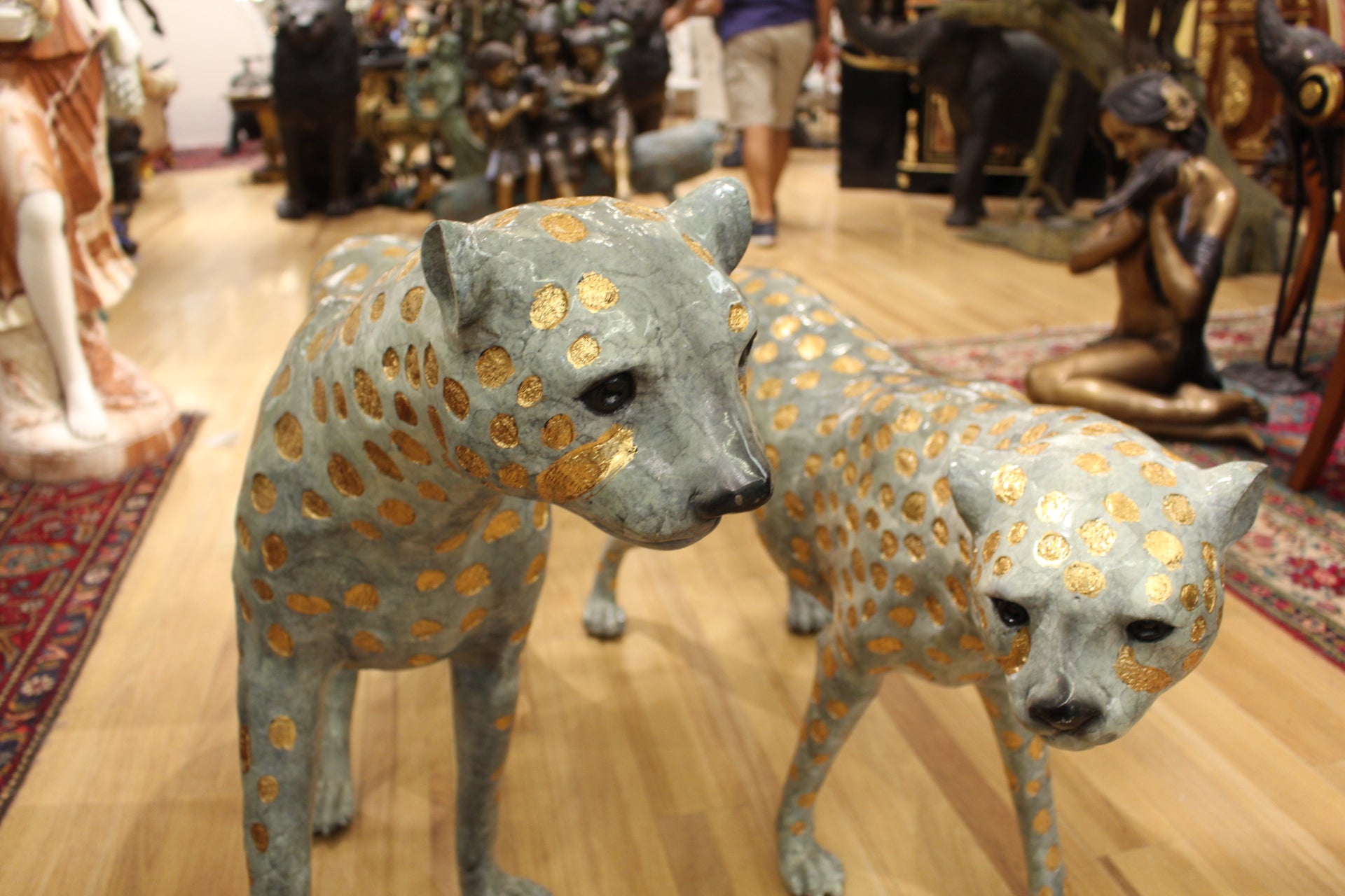 Pair of Golden-Plated Cheetahs Bronze Statue -  Size: 58"L x 10"W x 31"H. 