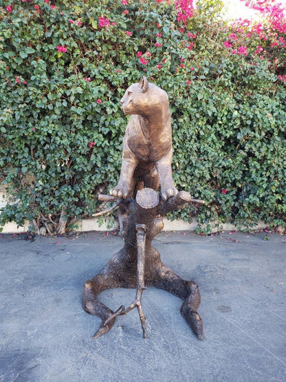 Mountain Lion Going Up a Tree Log Bronze Statue -  Size: 42"L x 65"W x 69"H.