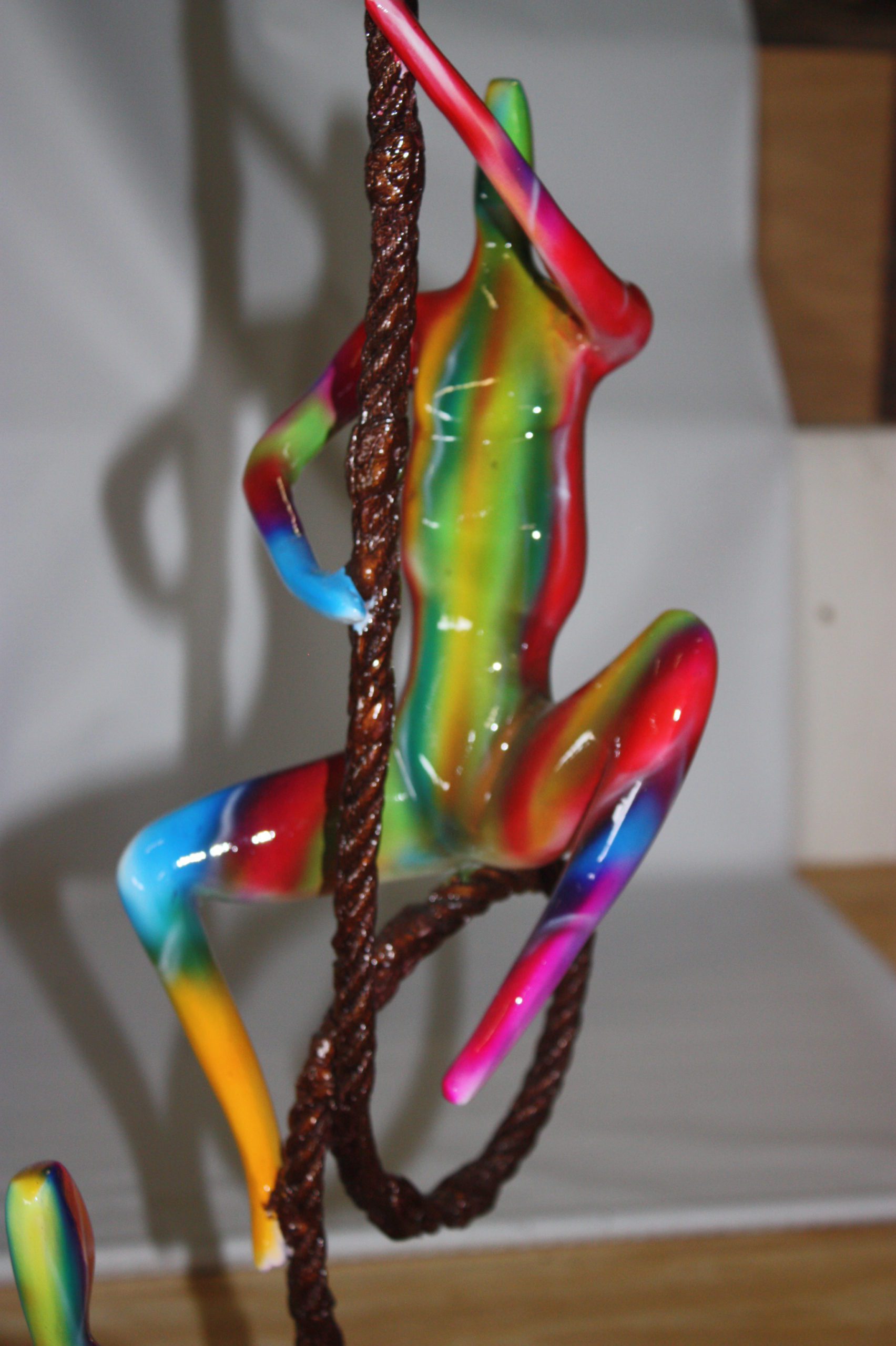 Three man made of Bronze climbing on rope -  Size: 10"L x 13"W x 37"H. 