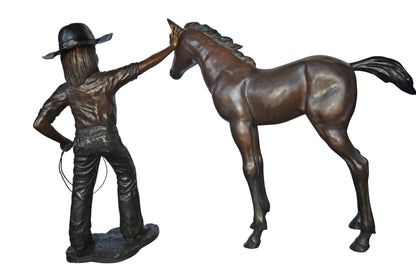 A Young Cowgirl with A Young Horse Bronze Statue Size: 60" x 30" x 44"H