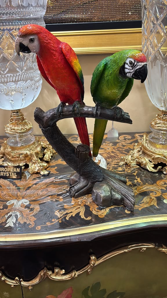 Two Bronze Colorful Parrots On A Tree Statue