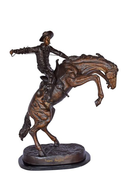 Bronco Buster by Remington Replica Bronze Statue - Size: 31"L x 17"W x 36"H.