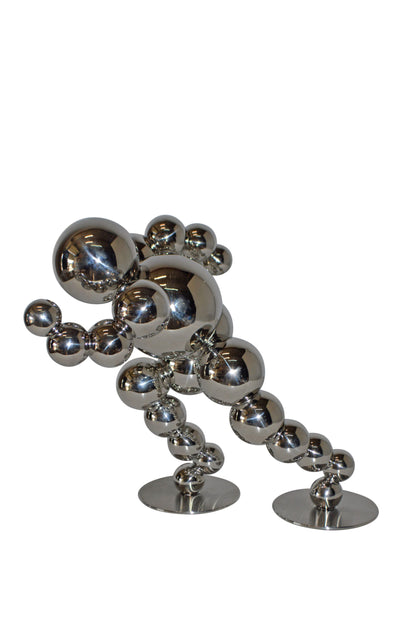 Modern Art Abstract of a Runner made of Chrome Balls - Size: 13"L x 9"W x 11"H.