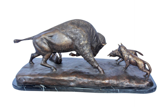 Charging bison v. Wolves bronze statue -  Size: 36"L x 17"W x 17"H.