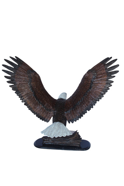 Perched eagle bronze statue -  Size: 35"L x 21"W x 29"H.