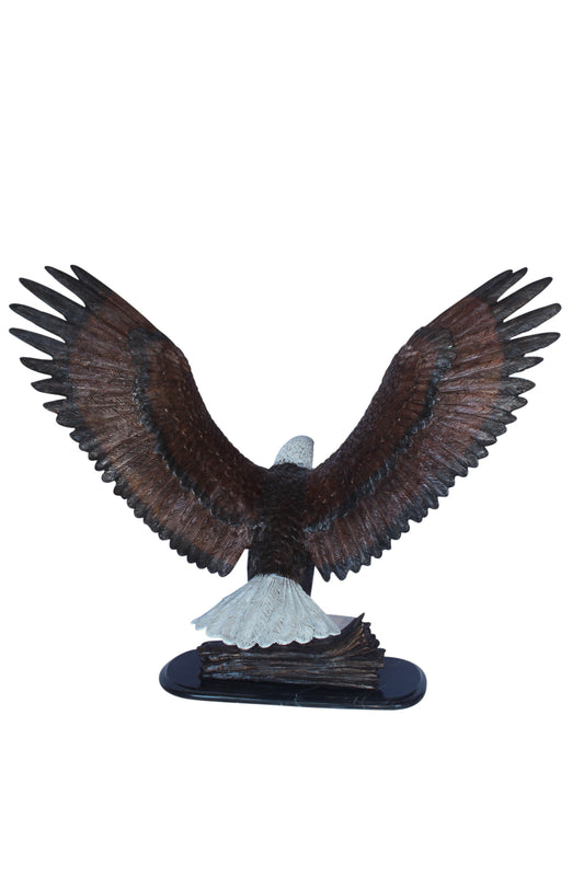 Perched eagle bronze statue -  Size: 35"L x 21"W x 29"H.