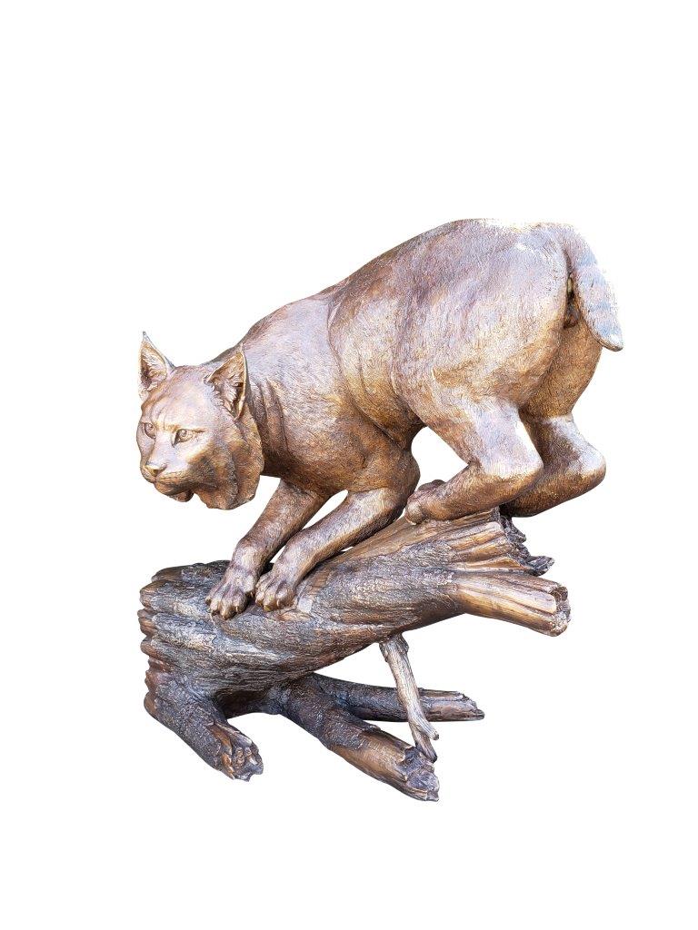 Bobcat Going Down a Tree Log Bronze Statue -  Size: 43"L x 25"W x 41"H.
