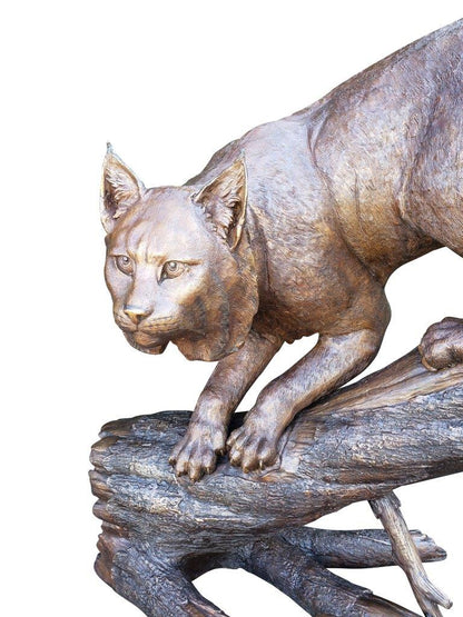 Bobcat Going Down a Tree Log Bronze Statue -  Size: 43"L x 25"W x 41"H.