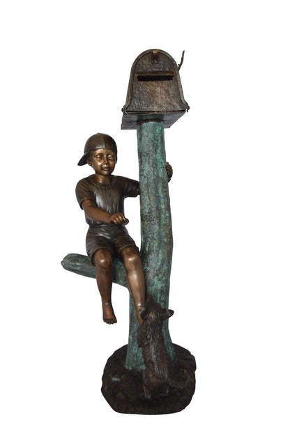 Boy Sitting on a Tree with Mailbox Bronze Statue -  Size: 22"L x 23"W x 49"H. 