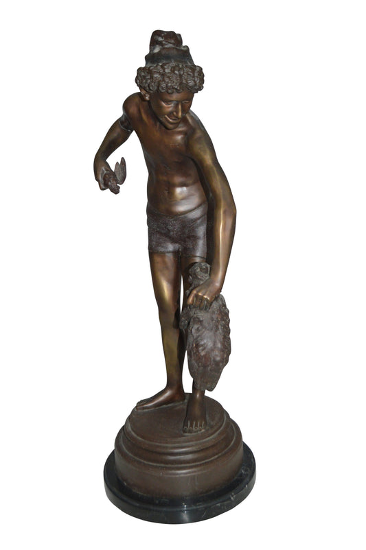 Boy holding a Dog and a Bird Bronze Statue -  Size: 15"L x 15"W x 36"H. 