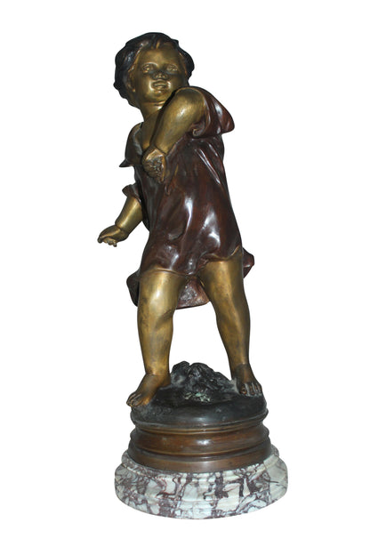 Boy standing Bronze Statue on Marble base -  Size: 10"L x 12"W x 26"H. 