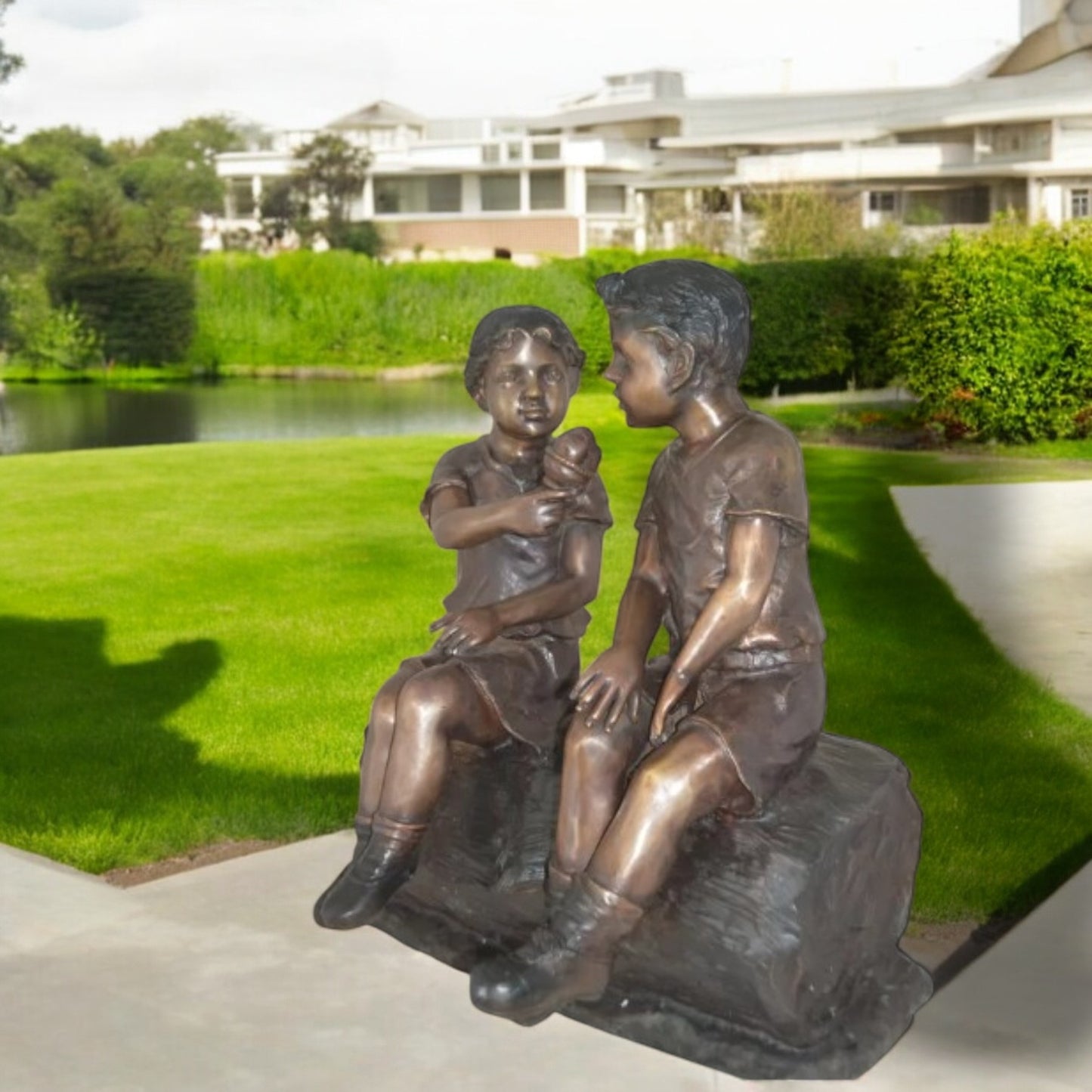 Boy and Girl enjoying an ice-cream bronze statue -  Size: 28"L x 24"W x 33"H.