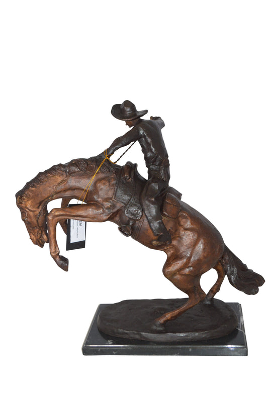 Bronco Buster Bronze Statue by Remington -  Size: 9"L x 24"W x 21"H. 