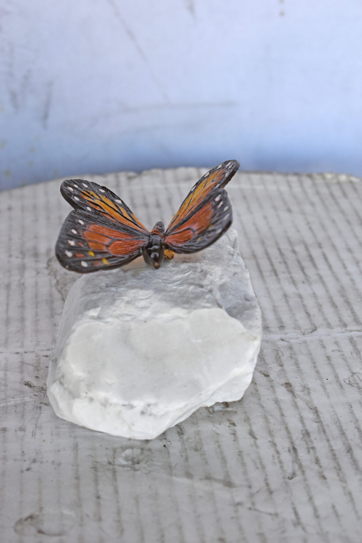 Black and Orange Butterfly made of Bronze mounted on a rock Size: 5" x 5" x 4"H
