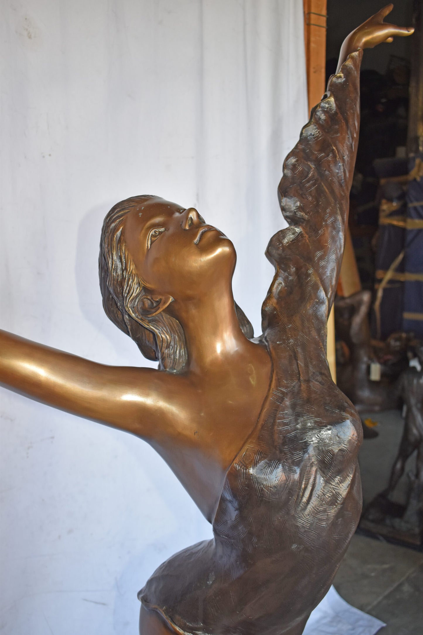 Ballet Dancer Performing on Stage Bronze Statue - Size: 45"L x 27"W x 71"H.