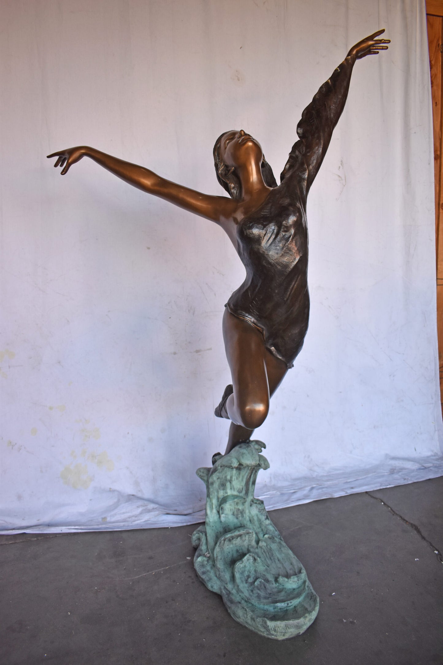 Ballet Dancer Performing on Stage Bronze Statue - Size: 45"L x 27"W x 71"H.