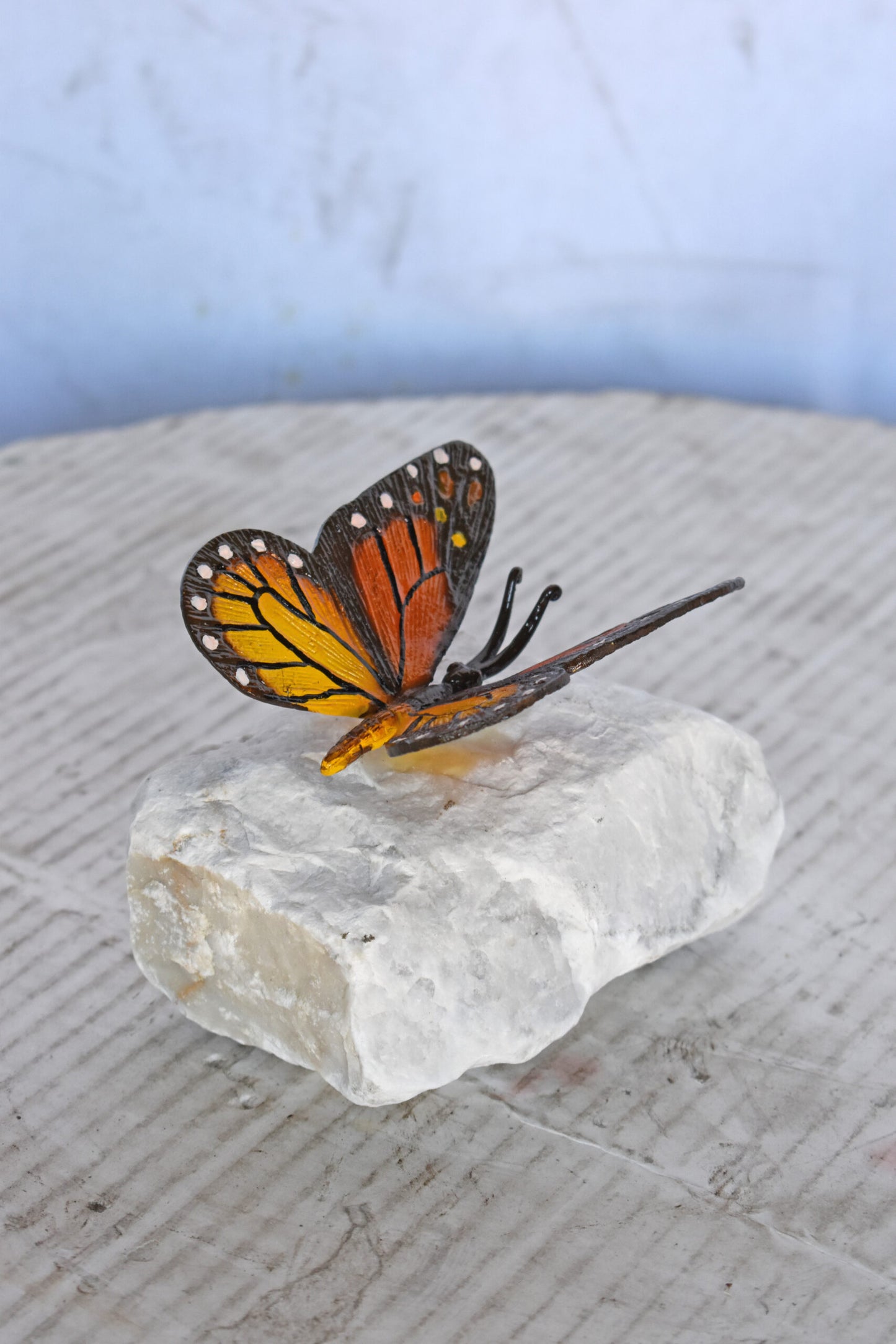 Black and Orange Butterfly made of Bronze mounted on a rock Size: 5" x 5" x 4"H