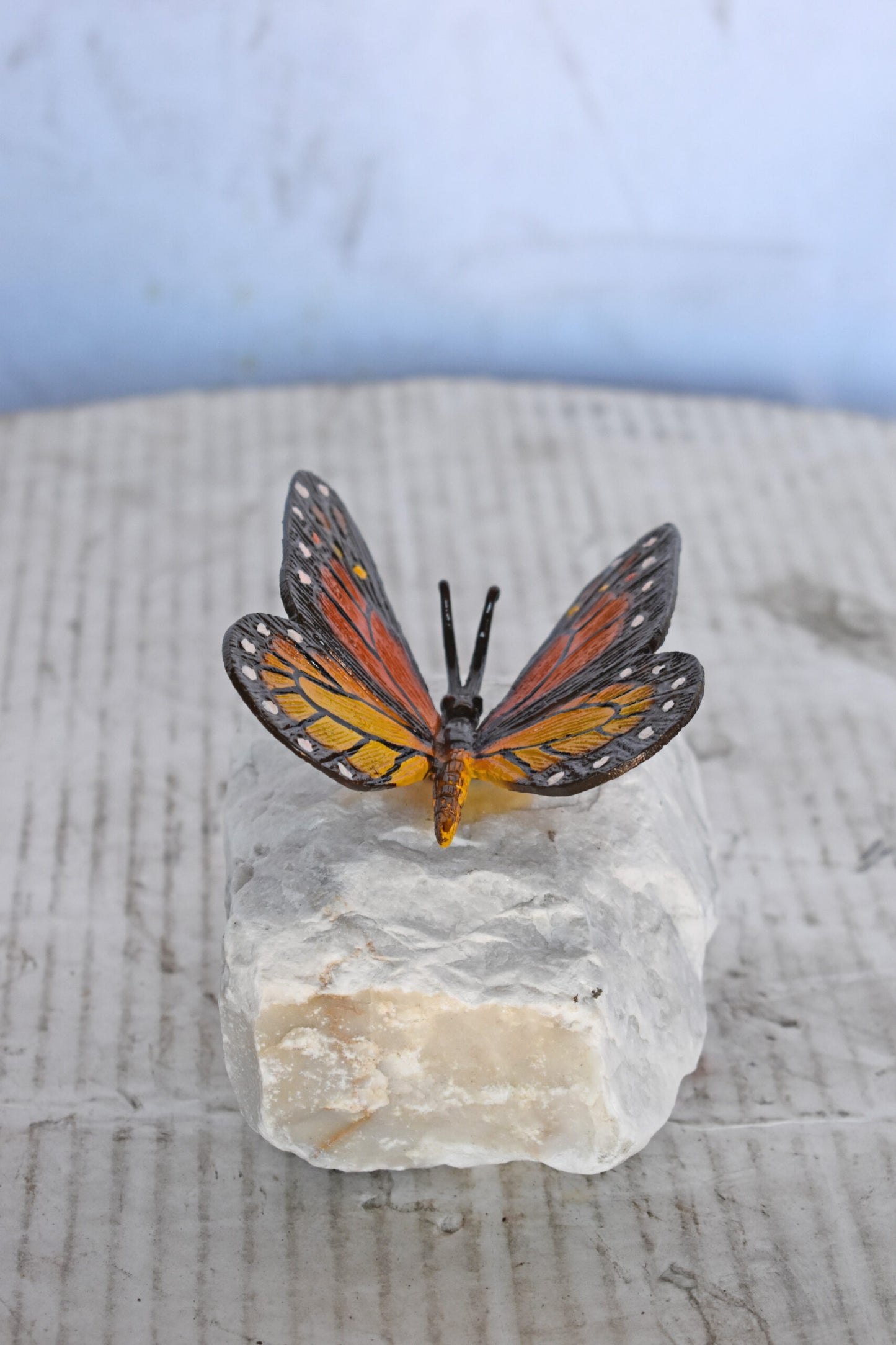 Black and Orange Butterfly made of Bronze mounted on a rock Size: 5" x 5" x 4"H