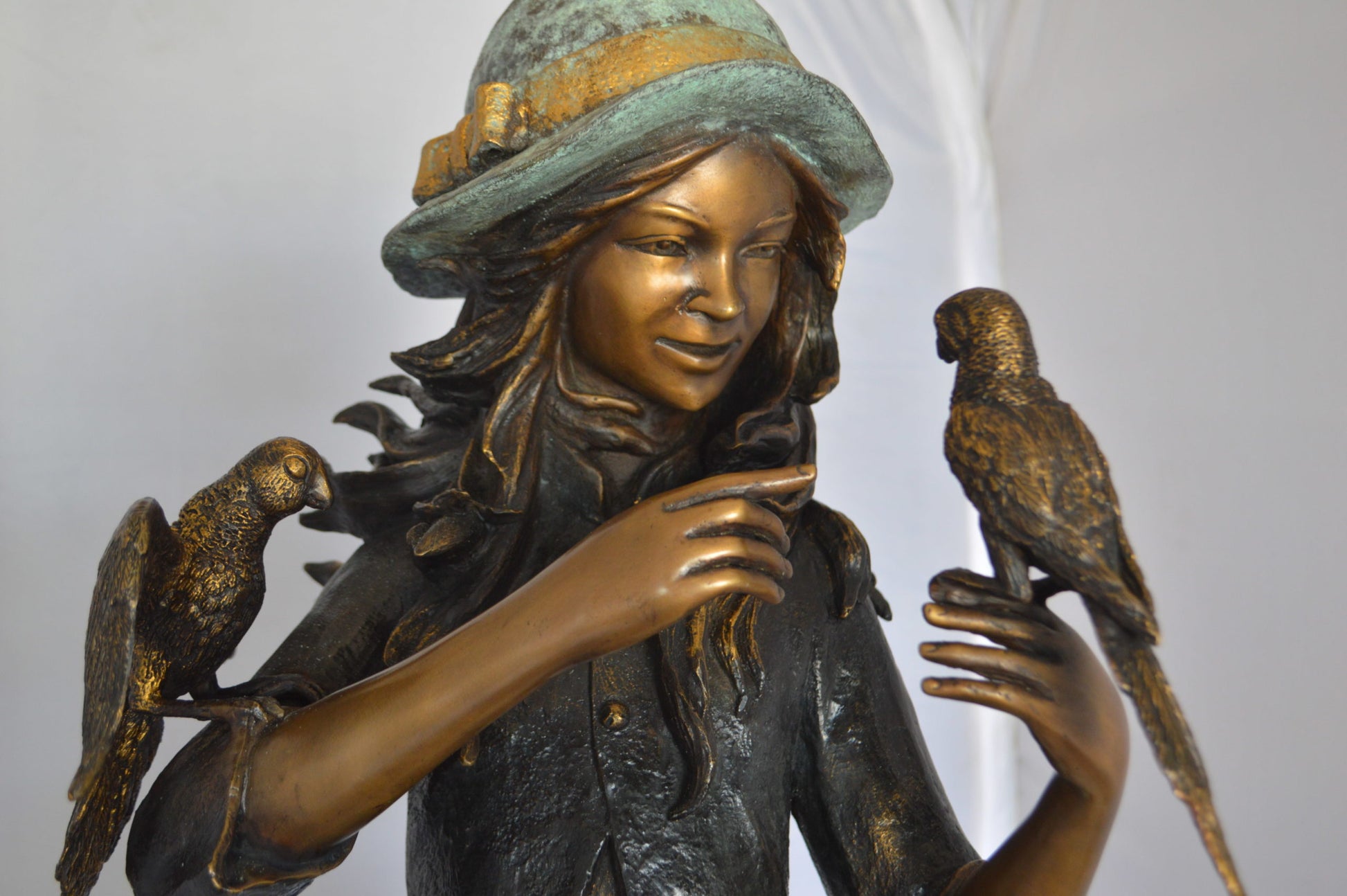 Standing girl with parrots Bronze Statue -  Size: 15"L x 16"W x 41"H. 