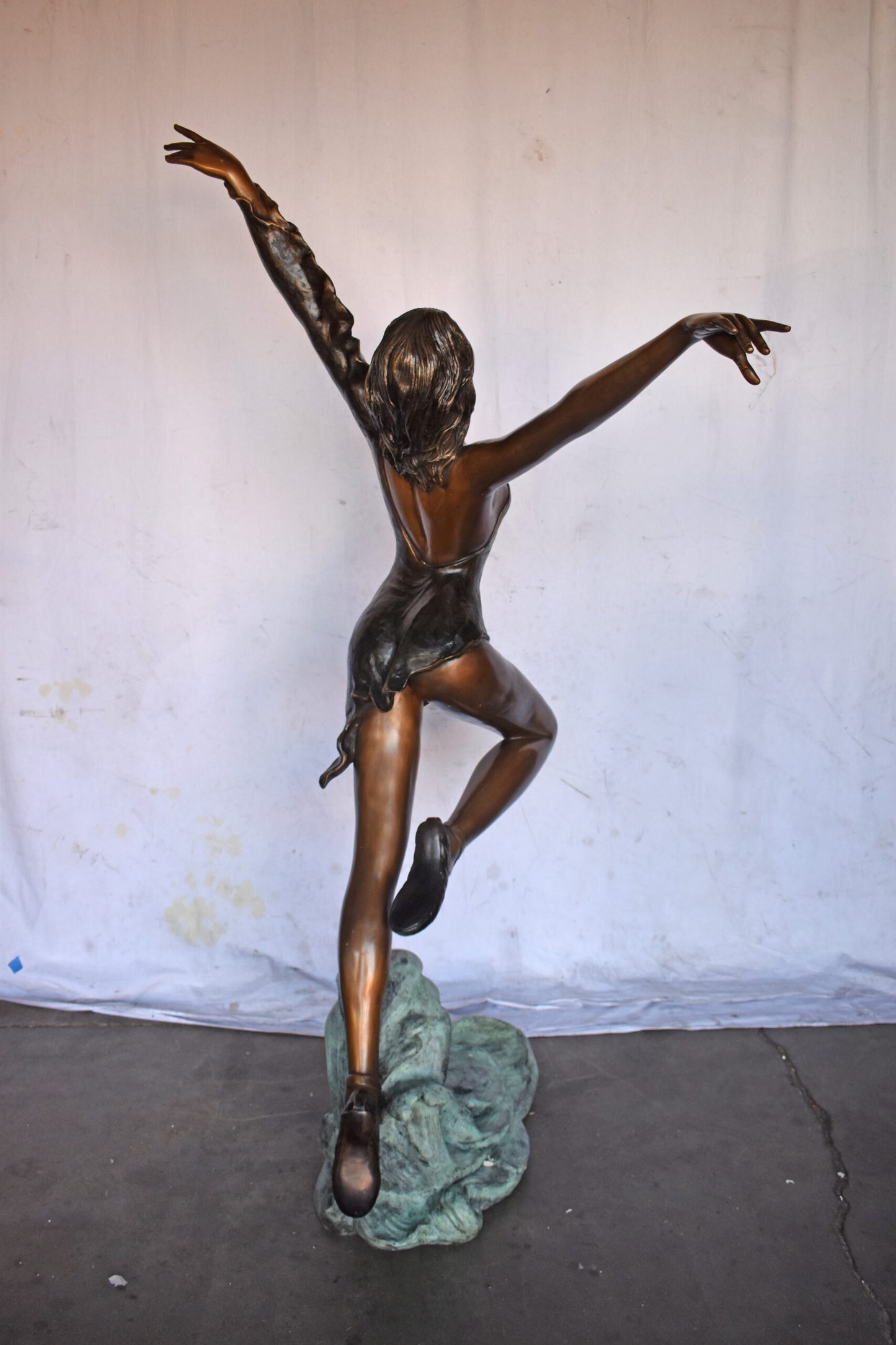 Ballet Dancer Performing on Stage Bronze Statue - Size: 45"L x 27"W x 71"H.