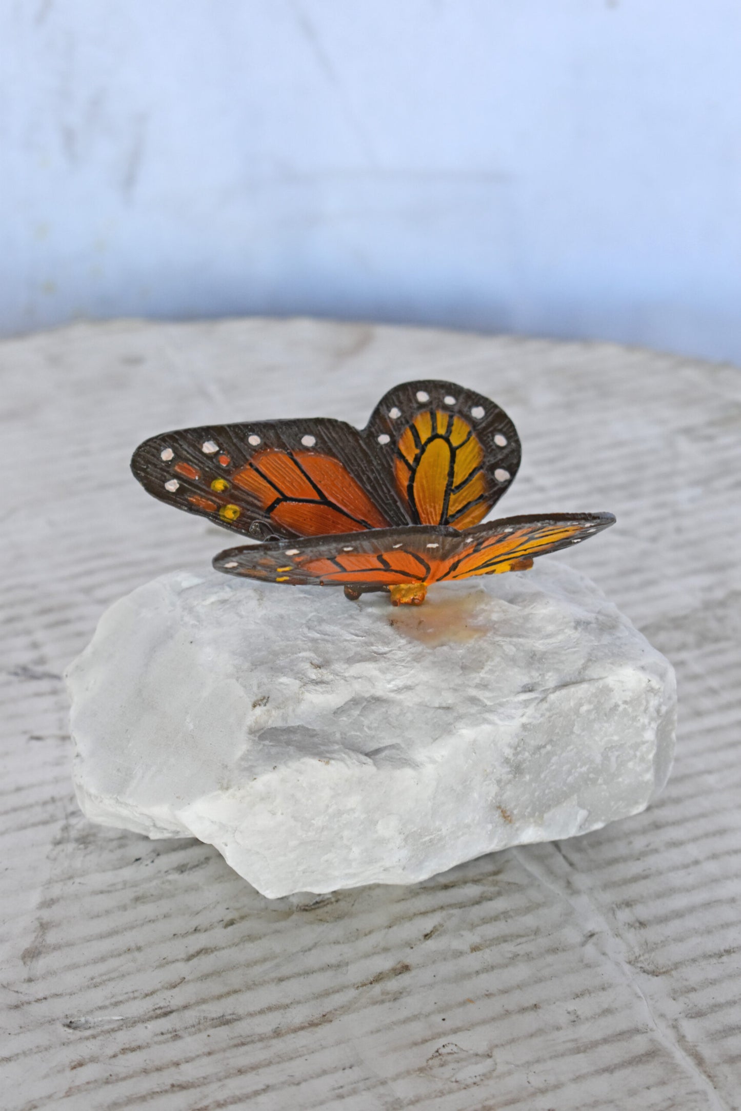 Black and Orange Butterfly made of Bronze mounted on a rock Size: 5" x 5" x 4"H