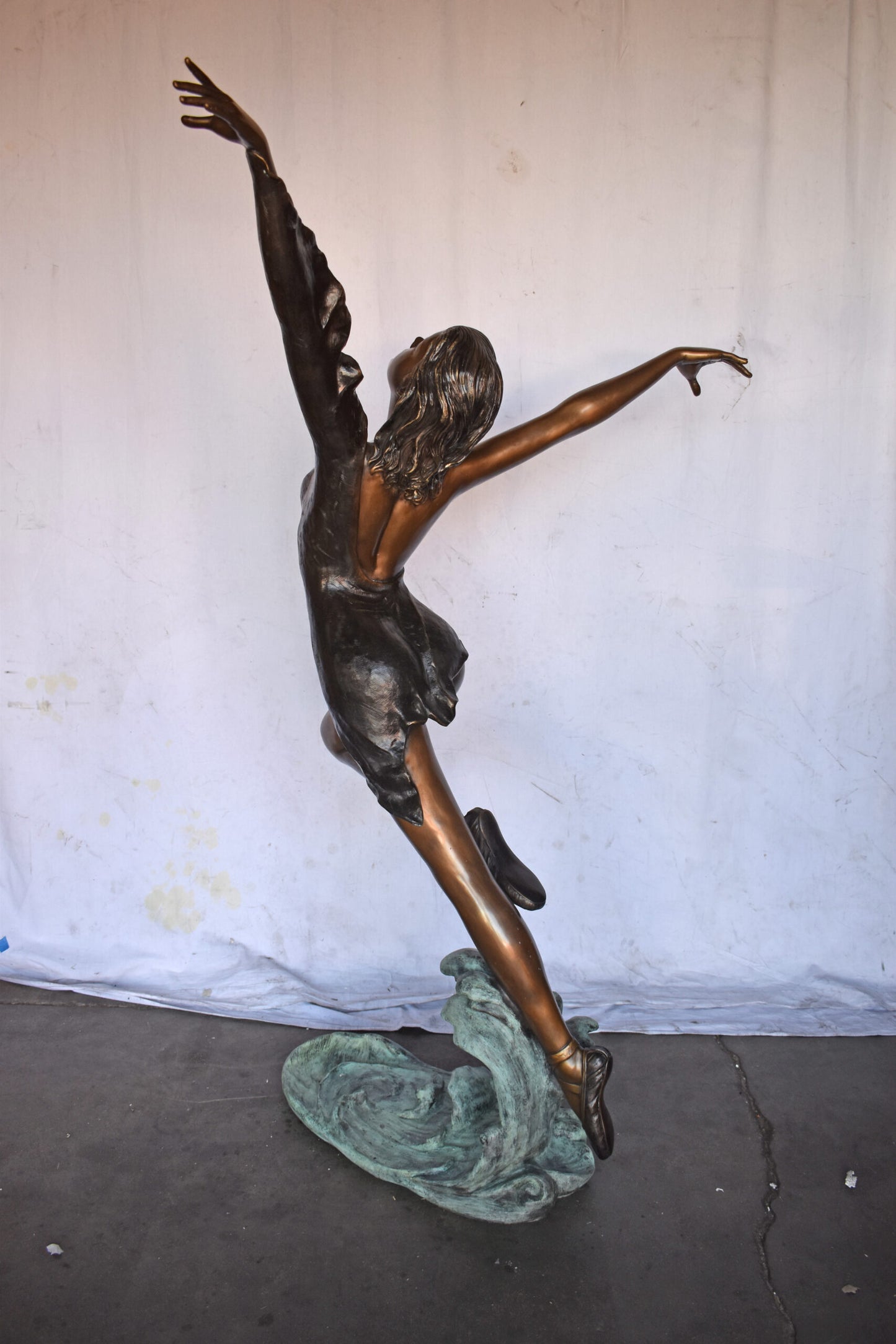 Ballet Dancer Performing on Stage Bronze Statue - Size: 45"L x 27"W x 71"H.
