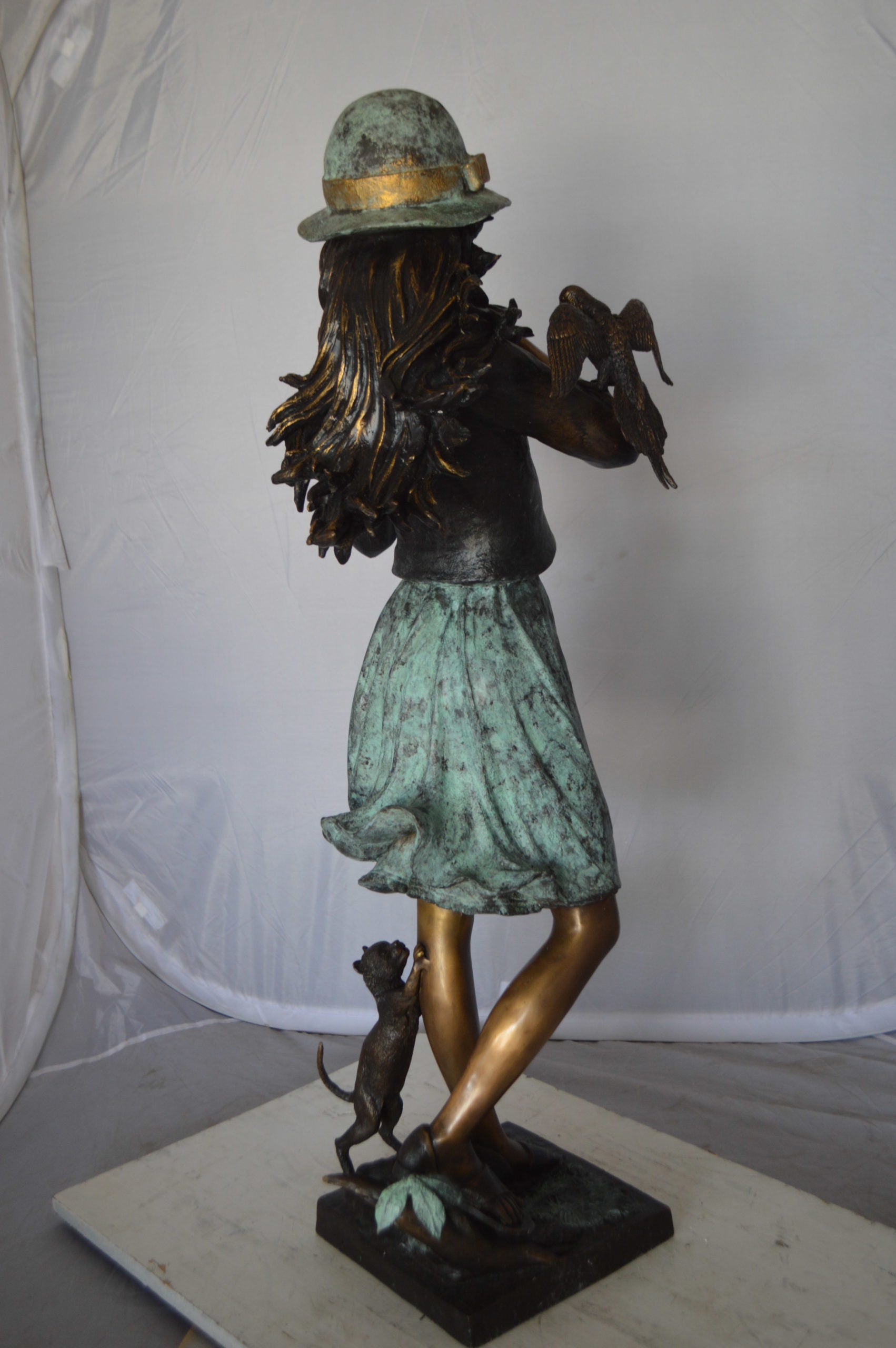 Standing girl with parrots Bronze Statue -  Size: 15"L x 16"W x 41"H. 