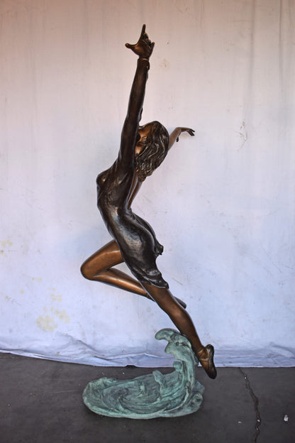 Ballet Dancer Performing on Stage Bronze Statue - Size: 45"L x 27"W x 71"H.